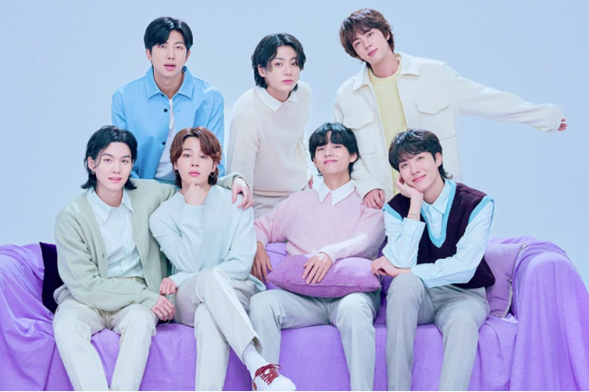This contains an image of BTS Members