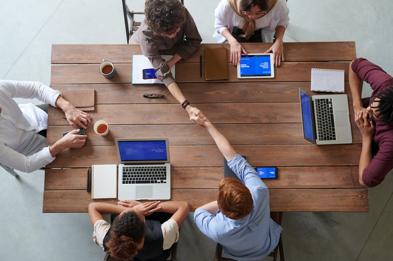 A group of people discussing about business structure