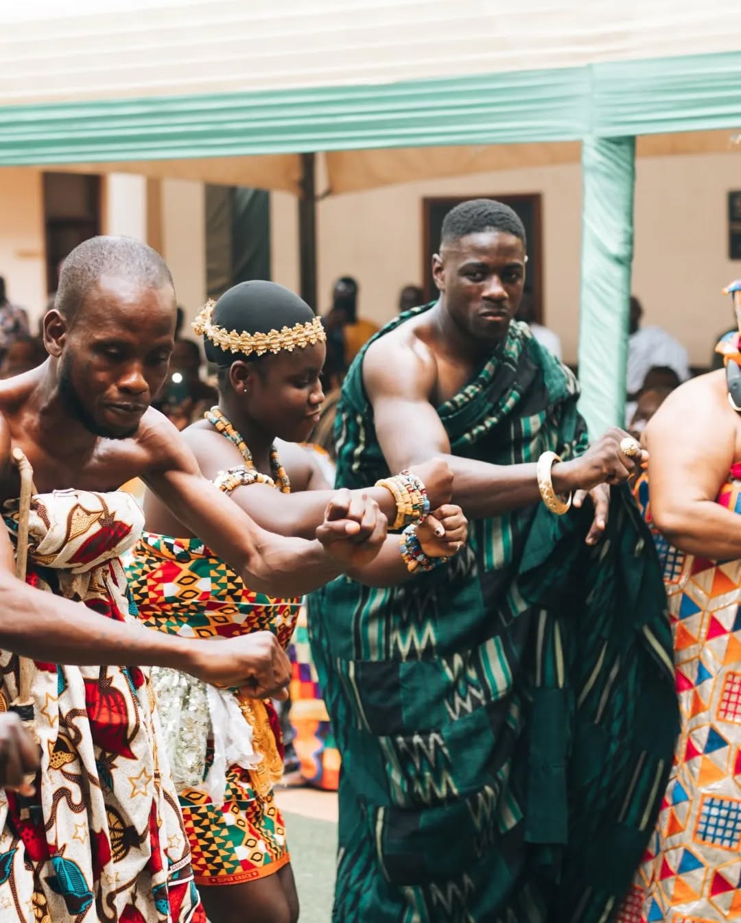 men performing adowa dance in their adornment. credit: new in ghana tourism on Instagram