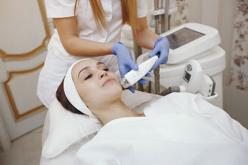 in this image laser hair removal treatment is given on the girl face at Ageology clinic by https://ageology.in/