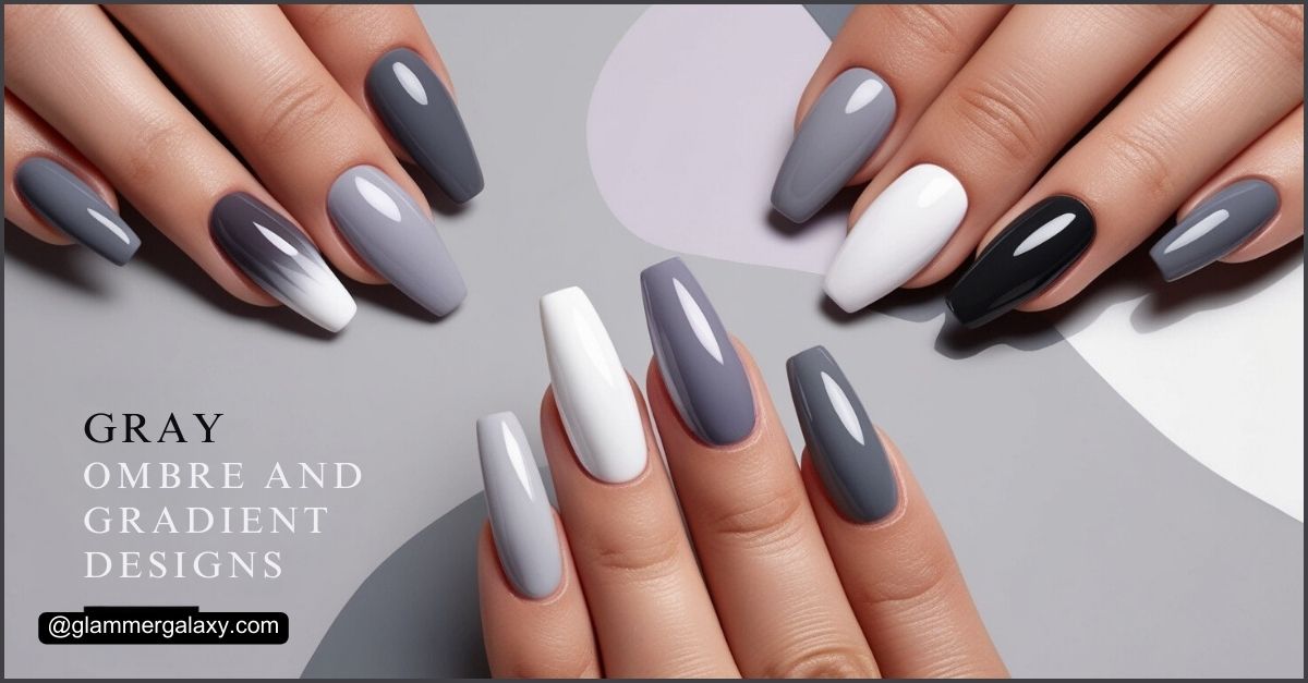 Manicured hands with gray ombre and gradient nail designs against a white background.