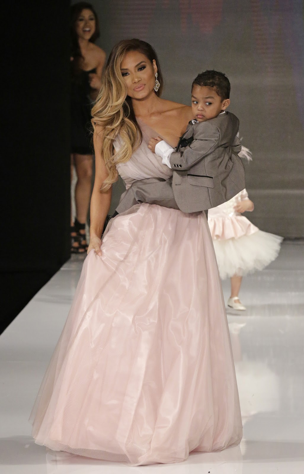 Daphne Joy and Sire Jackson at the Isabella Couture runway show on March 10, 2015, in Hollywood, California. | Source: Getty Images