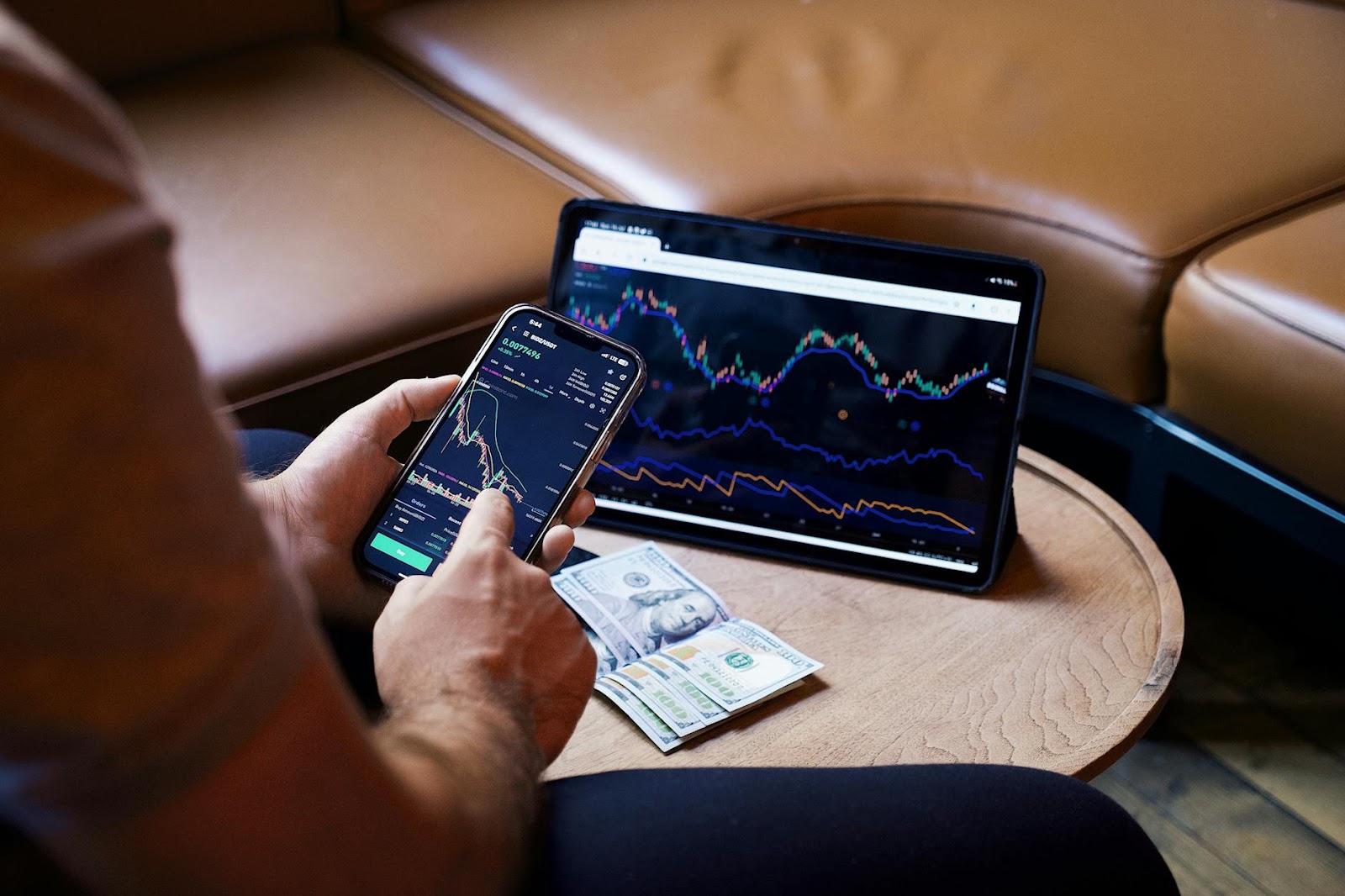 https://www.pexels.com/photo/man-looking-at-the-stock-charts-on-the-phone-and-tablet-17781647/