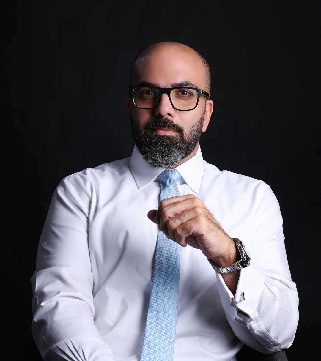A person in a white shirt and tie

AI-generated content may be incorrect.