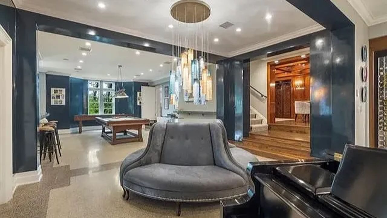 A Rare 1928 Tudor Mansion in Tulsa with Historic Charm, Soaring Ceilings, and 3 Acres of Lush Landscaping and Scenic Views