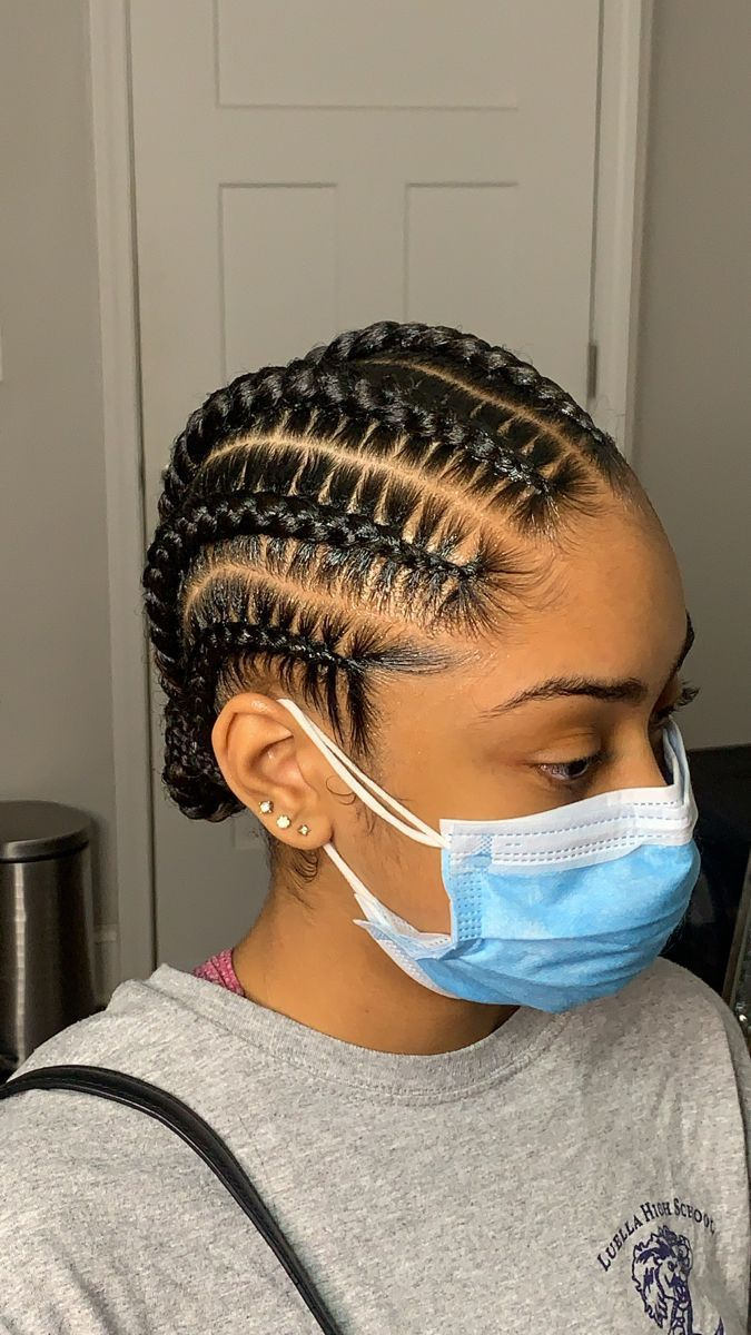 a lady rocking sleek, stitch cornrows