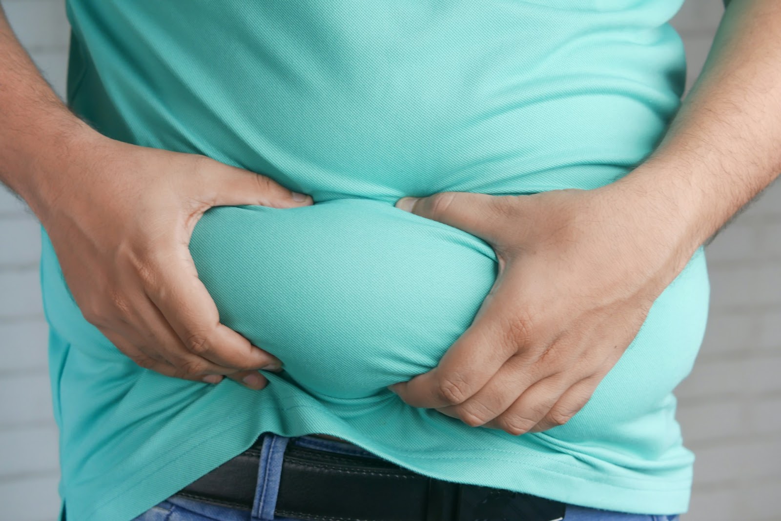 A woman who is bloated. 