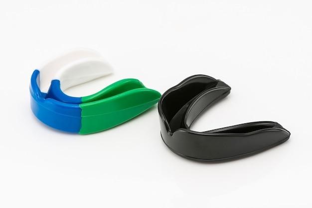 Protection for the teeth in the martial arts on a white background. sportswear