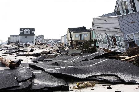 A destroyed house in the aftermath of hurricane sandy

Description automatically generated