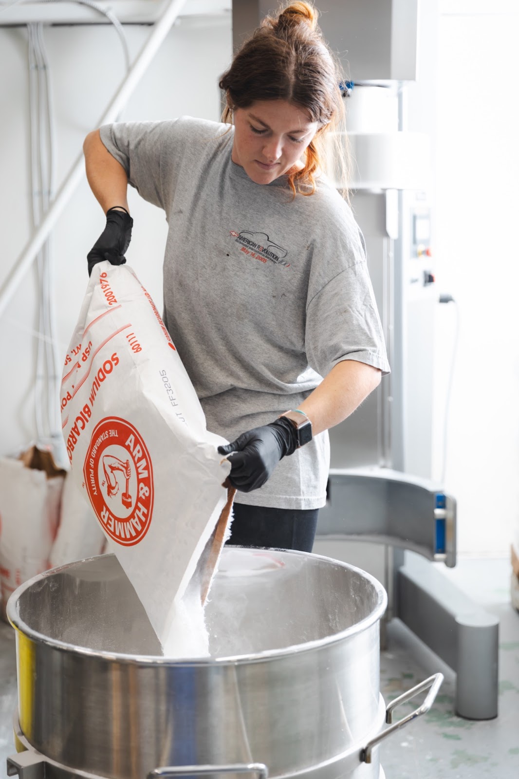 Old Whaling Co. production manager Cam pouring baking soda
