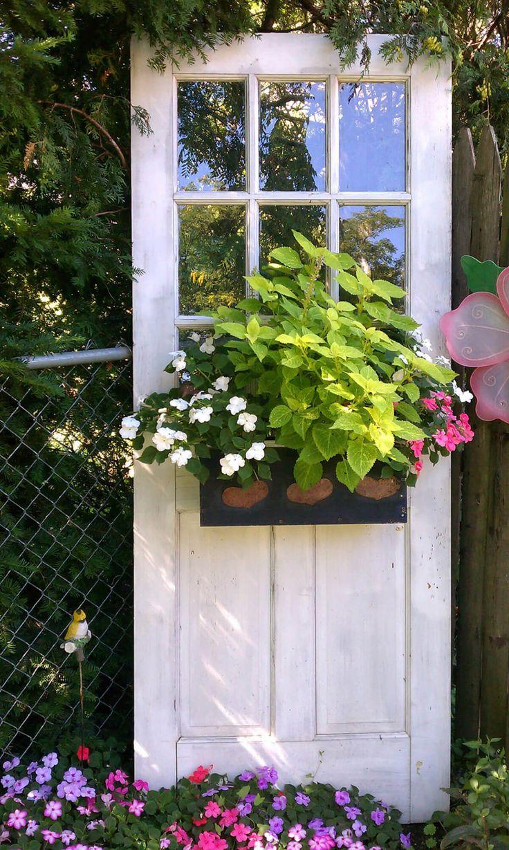 27 Creative Ways to Use Old Doors as Outdoor Decorations