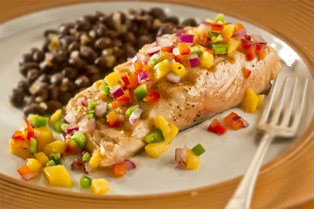 Salmon with mango salsa and a side of black beans The Columbus 