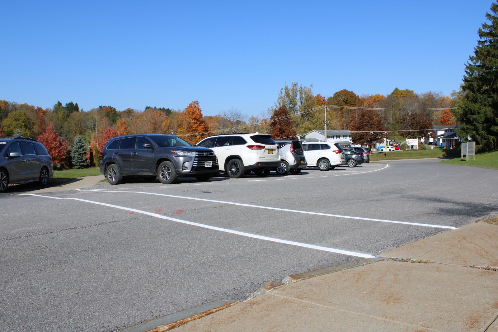 New crosswalk and parking spaces are located in the back parking lot of Burton Street Elementary School.