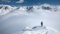 Mountain Hiking at Snowcapped Peak