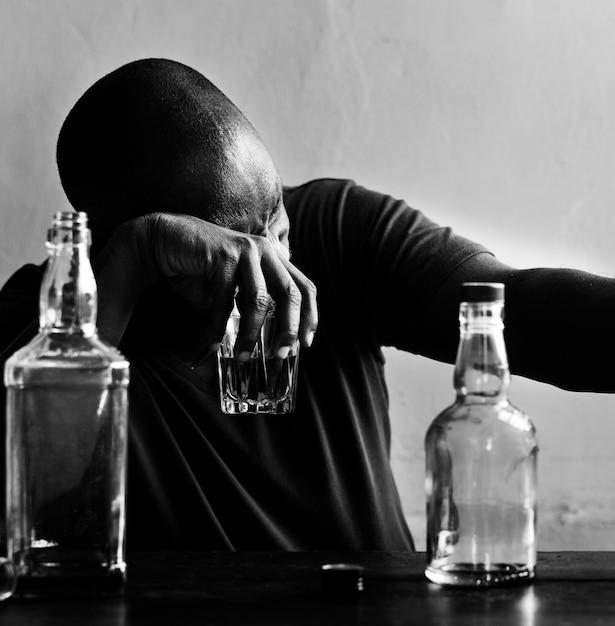 African American man drinking alcohol