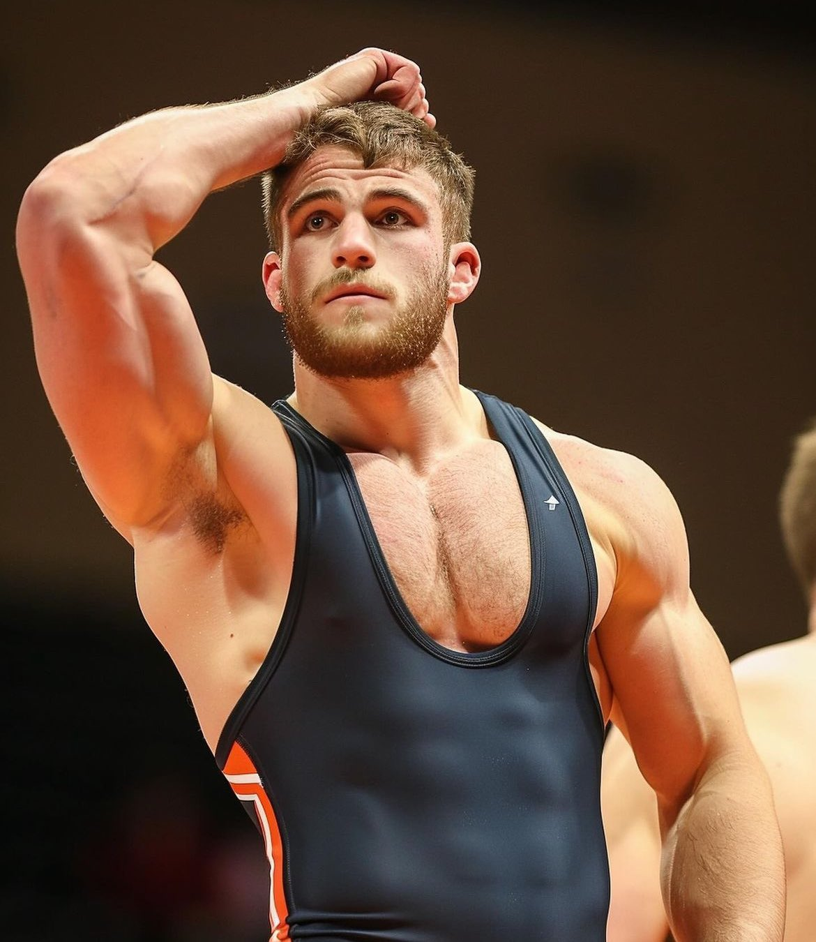 hard muscled wrestler showing off his hard hairy pecs and big biceps in black wrestling singlet