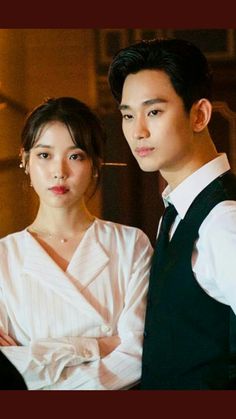 This contains an image ofKim Soo Hyun and IU 