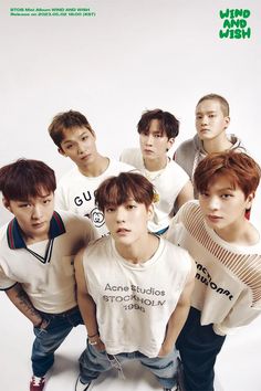 This  contain an image of  BTOB group 
 posing together for a photo in front of a white background