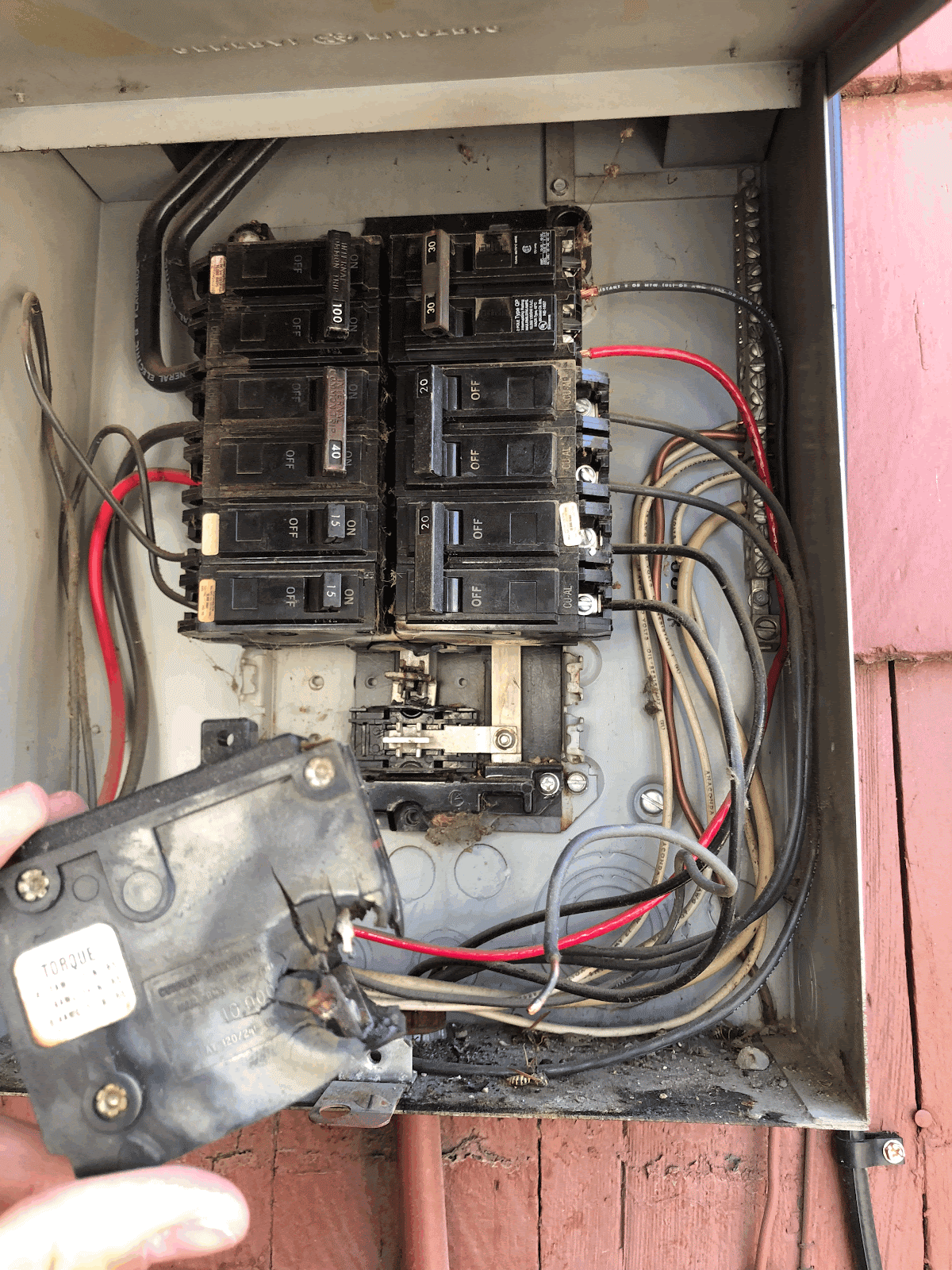 An old breaker box shows the need for an electrical panel upgrade