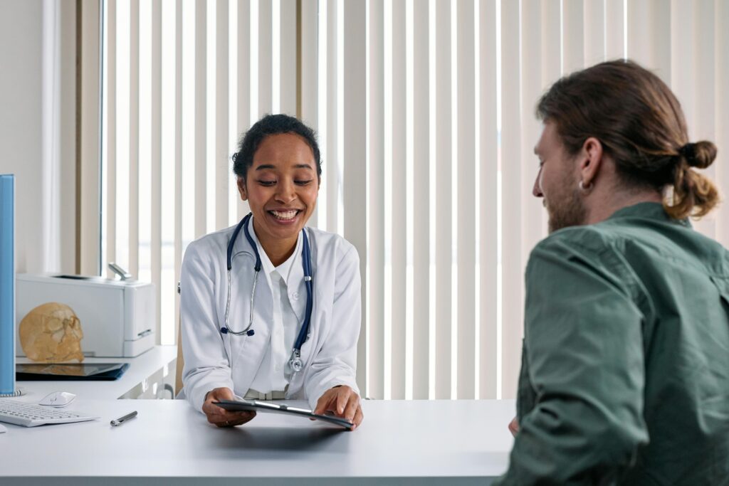 Doctor speaking with patient