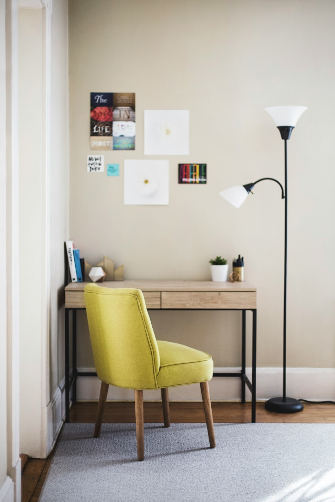 Room with LED lighting and natural sunlight filtering in through large windows