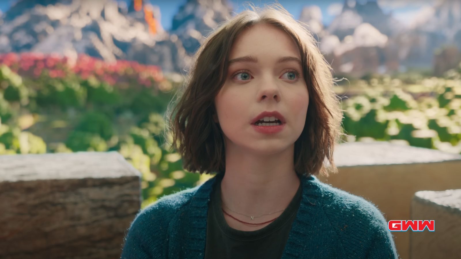 Natalie with short hair, looking surprised in the Minecraft movie.