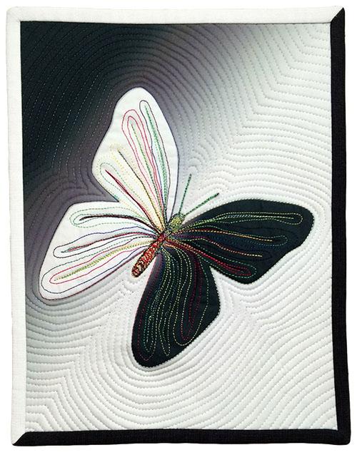 Macintosh HD:Users:jrapacki:Documents:Data - Biz-Artist-Educator:Articles by Jen:2016 Quilting Arts - Joining binding in corners:Photos of quilts w binding joined in corners:low res jpg files:finished butterfly.jpg