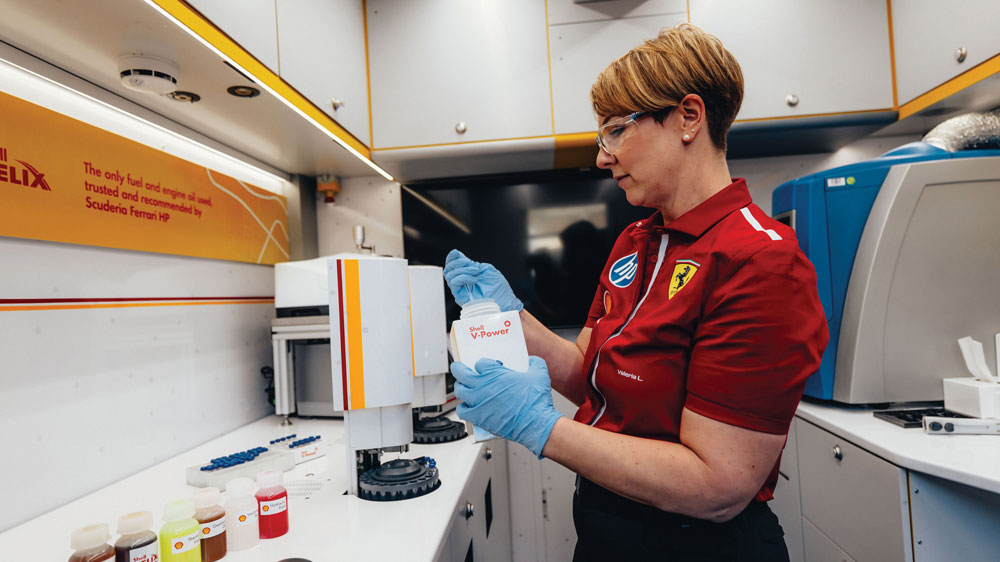 A member of the Scuderia Ferrari HP team at work in the Shell Track Lab