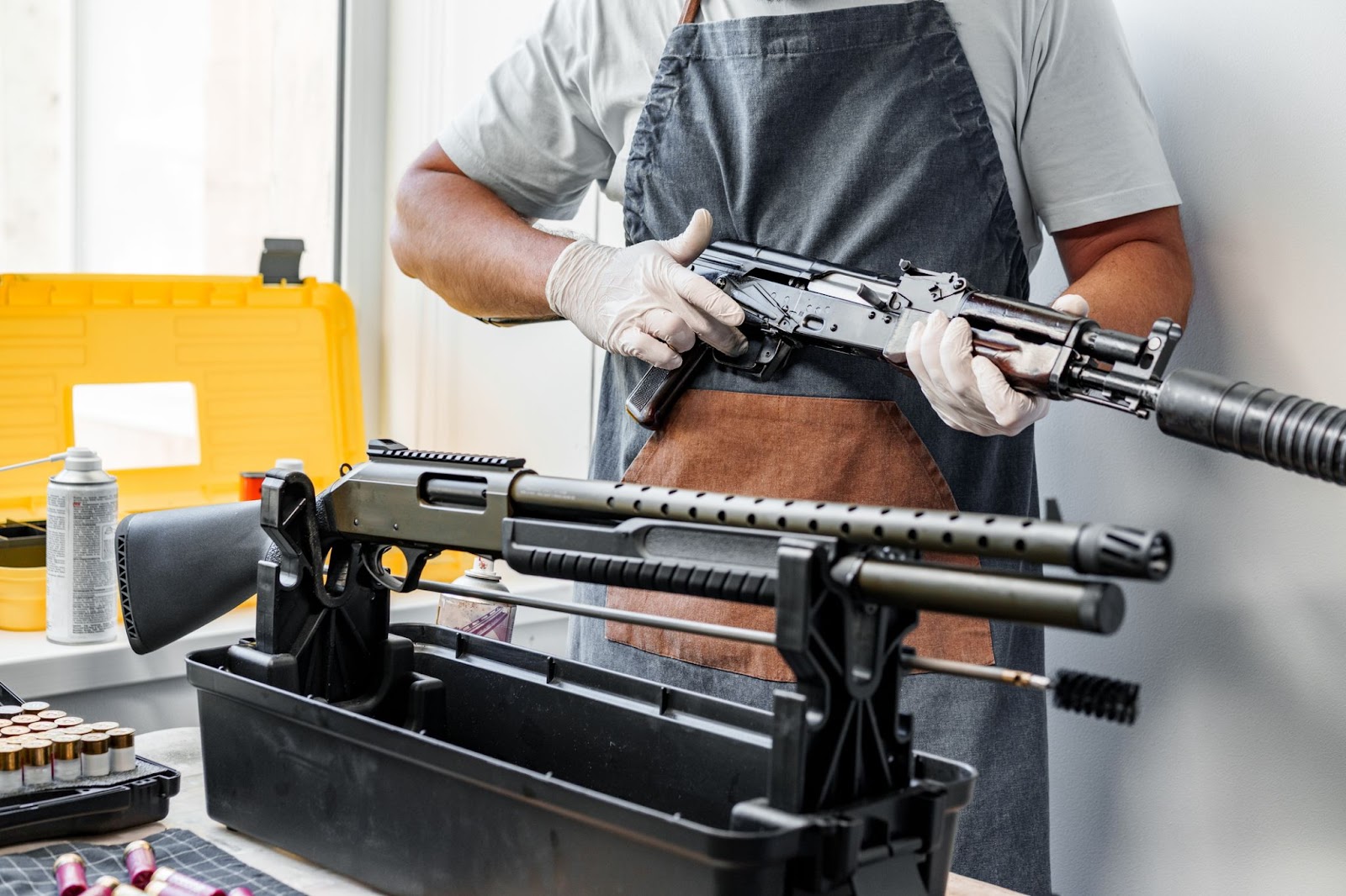 Man working on customizing a firearm in a Houston gunstore