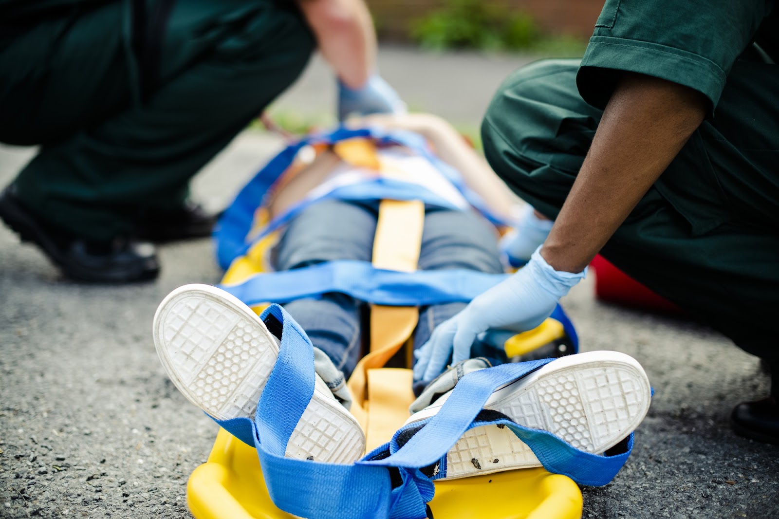  Paramedic team rescuing a  patient on stretcher 