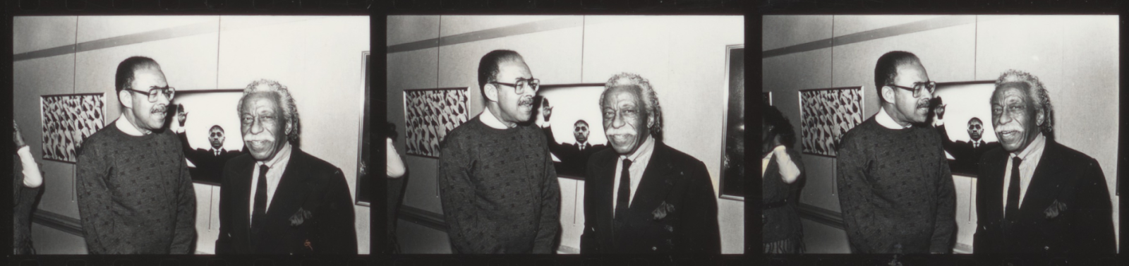 Image: Three panels of a black-and-white contact sheet, from 1993, showing photos of Moneta Sleet Jr (left) with Gordon Parks (right) in front of two framed photo prints on the wall behind them. Photograph by Fred Watkins. Johnson Publishing Company Archive. Courtesy J. Paul Getty Trust and Smithsonian National Museum of African American History and Culture.