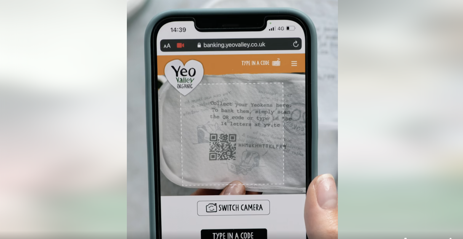 A screenshot from YEO Valley's facebook page, featuring an image of a QR Code that drives scanners to a charity donation portal