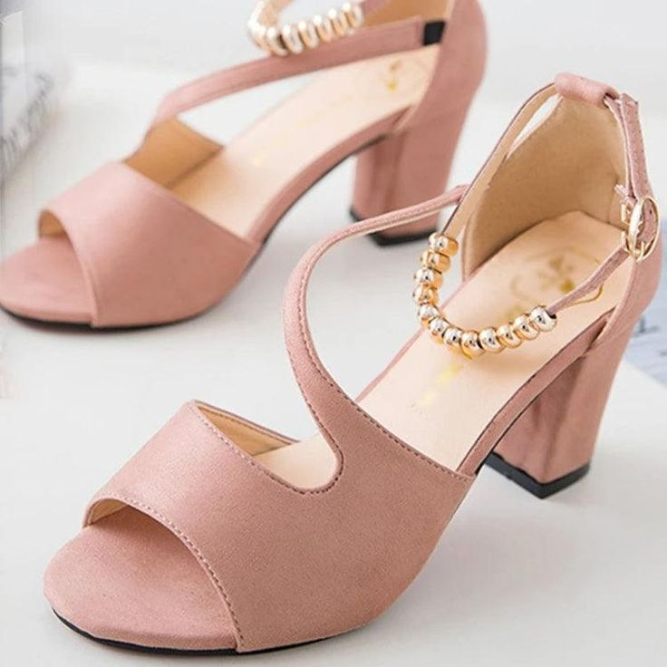 A pair of chunky sandals worn with a relaxed spring outfit, perfect for a day out.