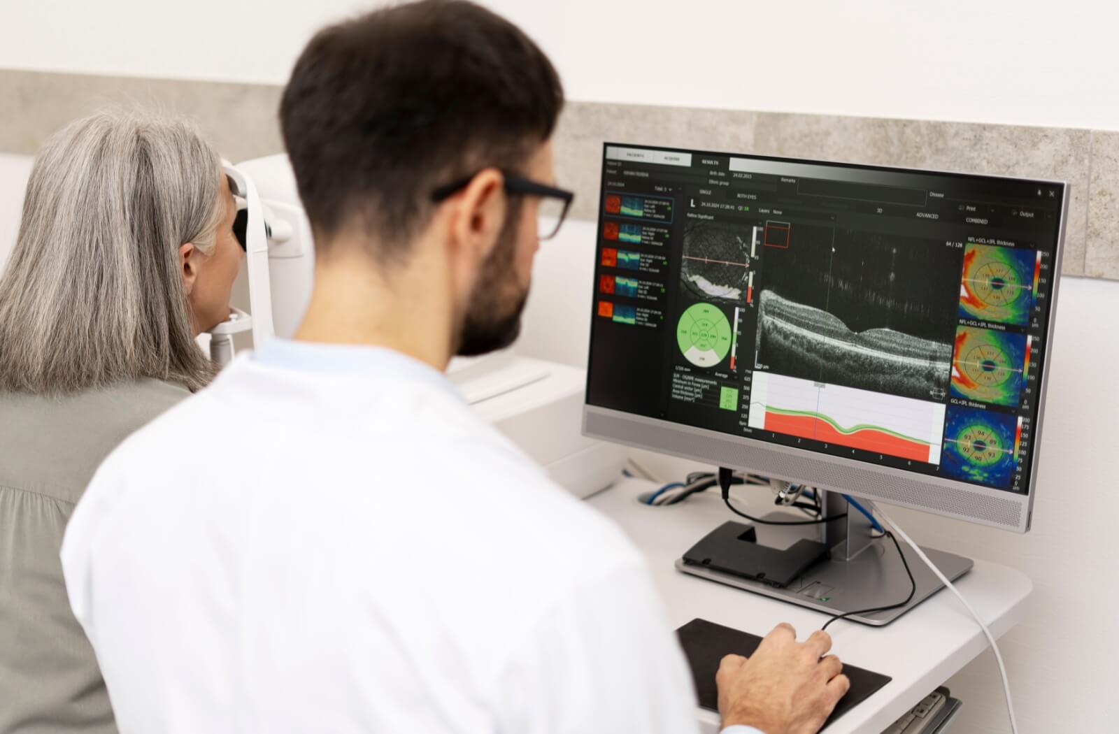 An eye doctor takes OCT scans of a patient during their routine eye exam.