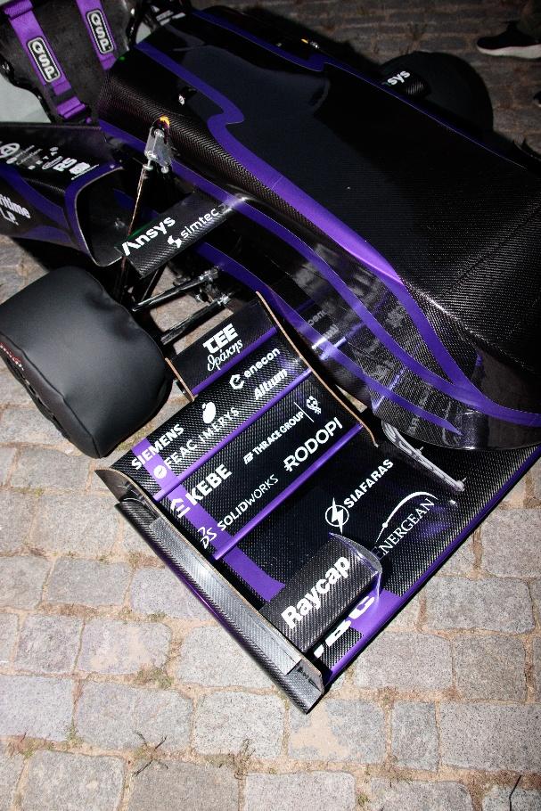 A close-up of a race car

AI-generated content may be incorrect.