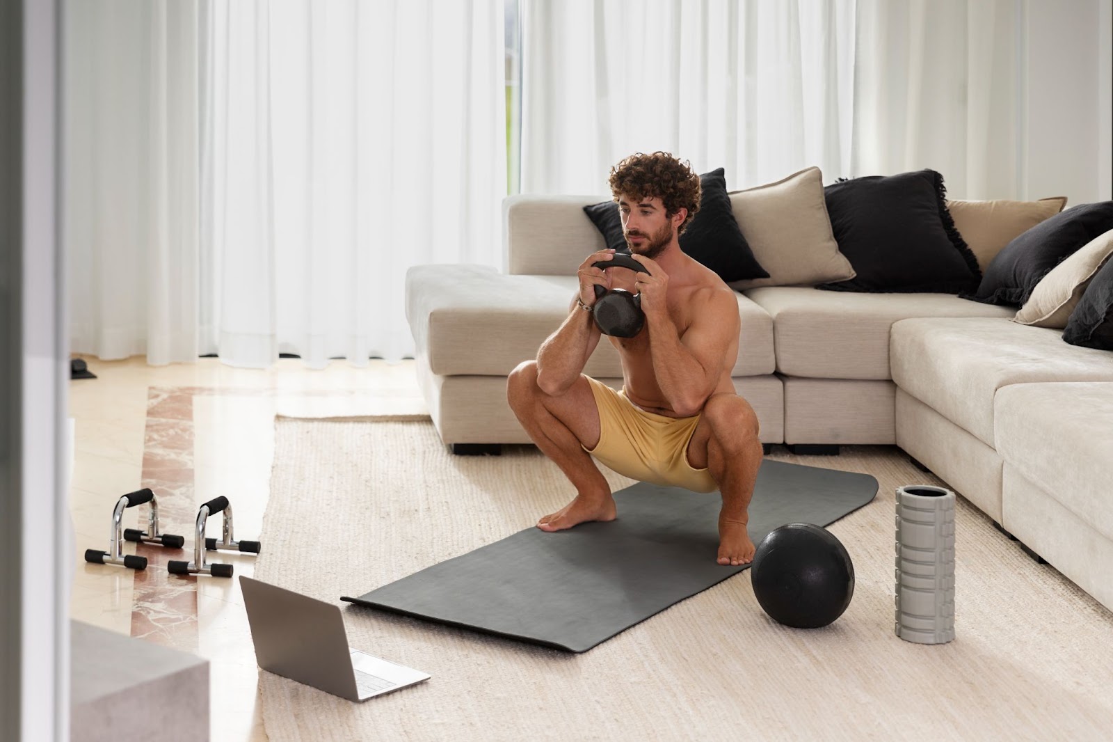 Full shot man performing home workout routine