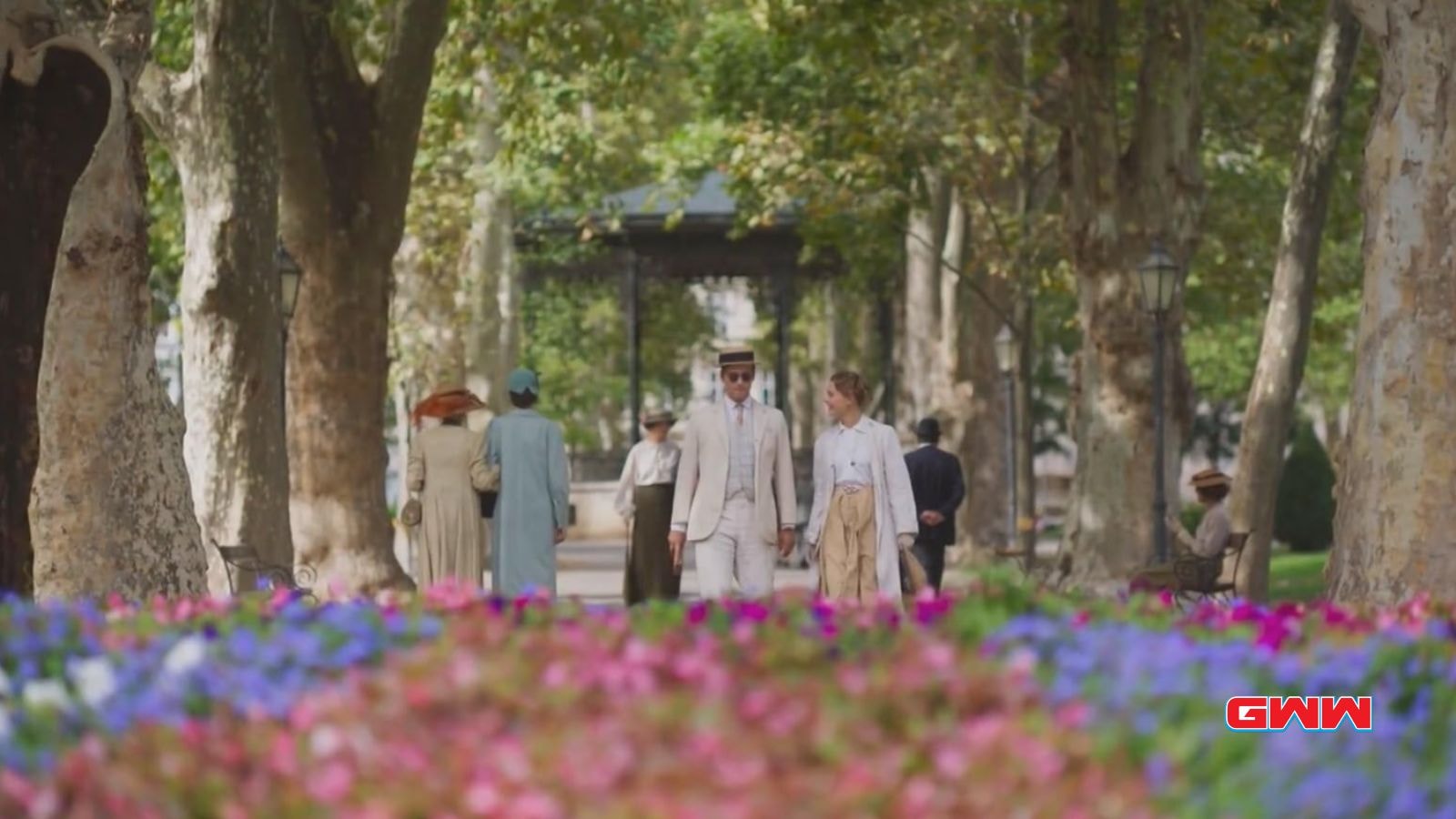 Lucian and Constance walking in the park, Hotel Portofino Season 3 Cast