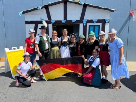 A group of people posing for a photoAI-generated content may be incorrect.