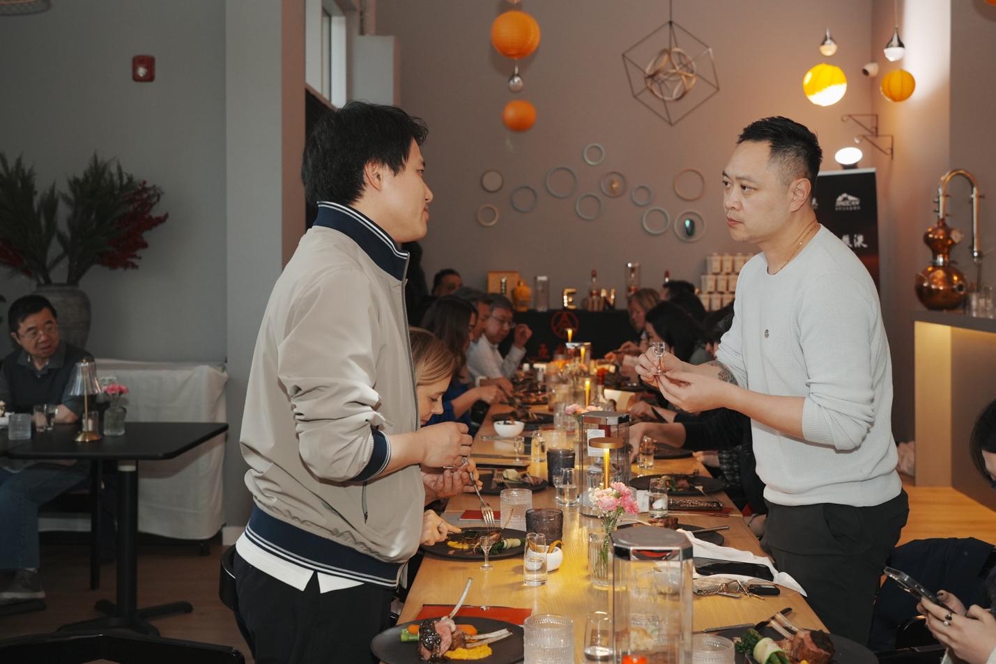 A group of people at a table

AI-generated content may be incorrect.