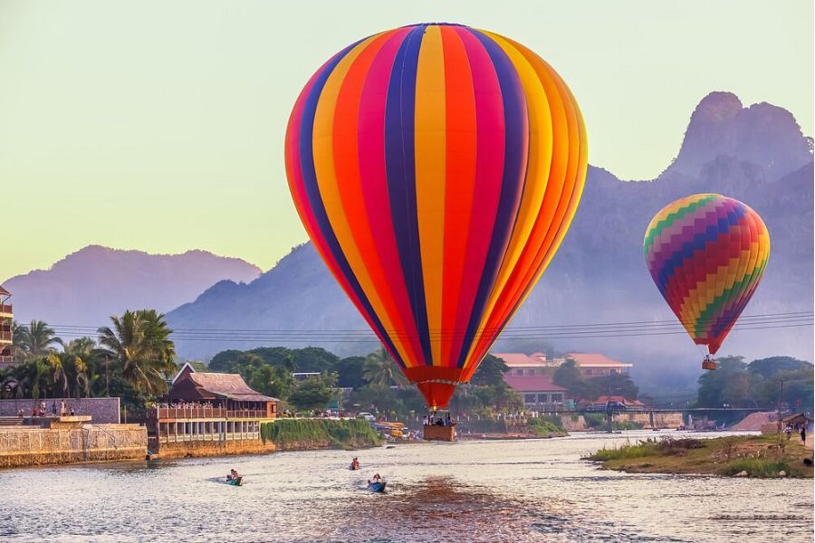 You can experience hot air ballooning, see the whole view of Vang Vieng from above