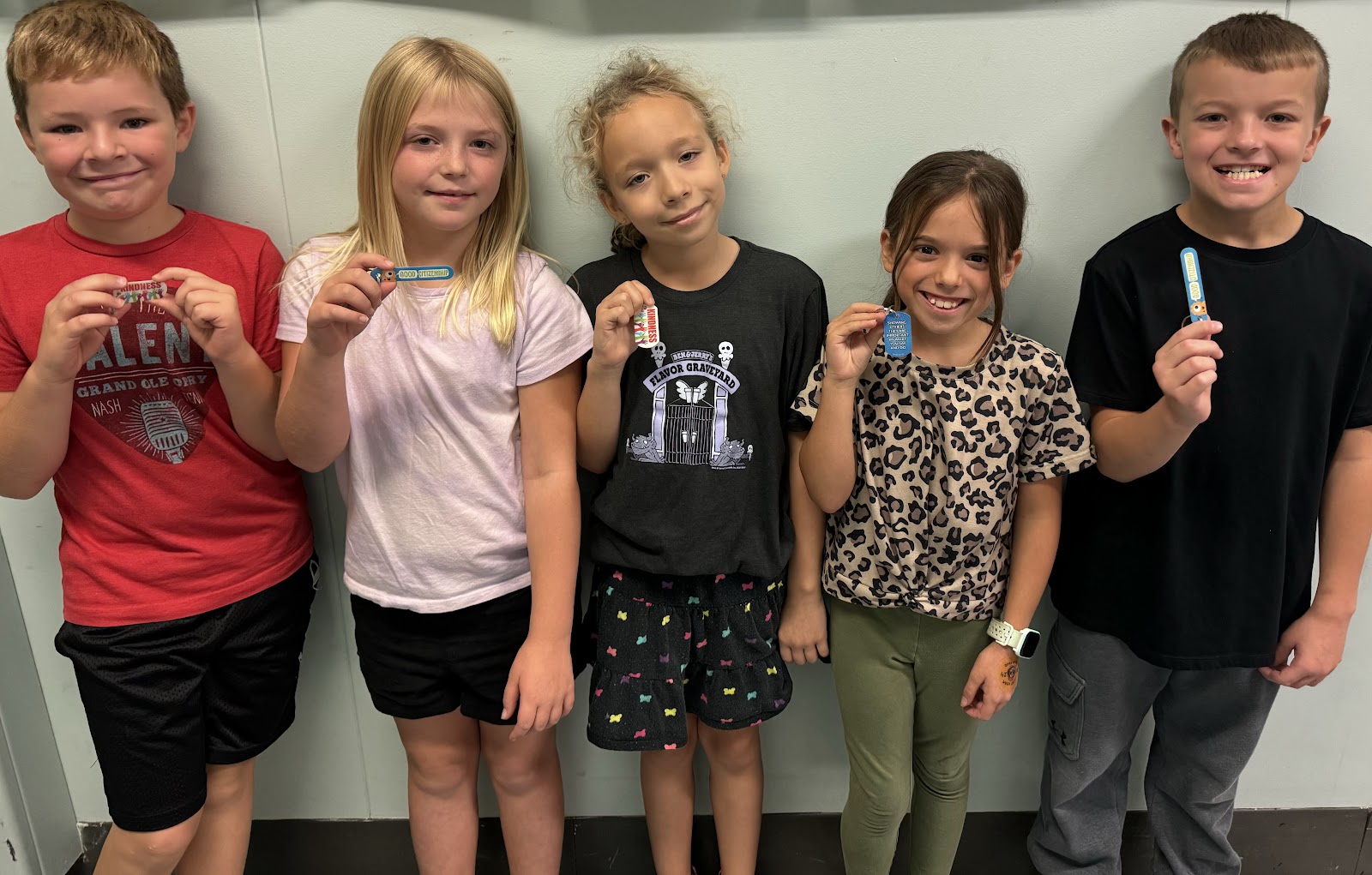 image of 5 second graders that helped to clean the lunch tables