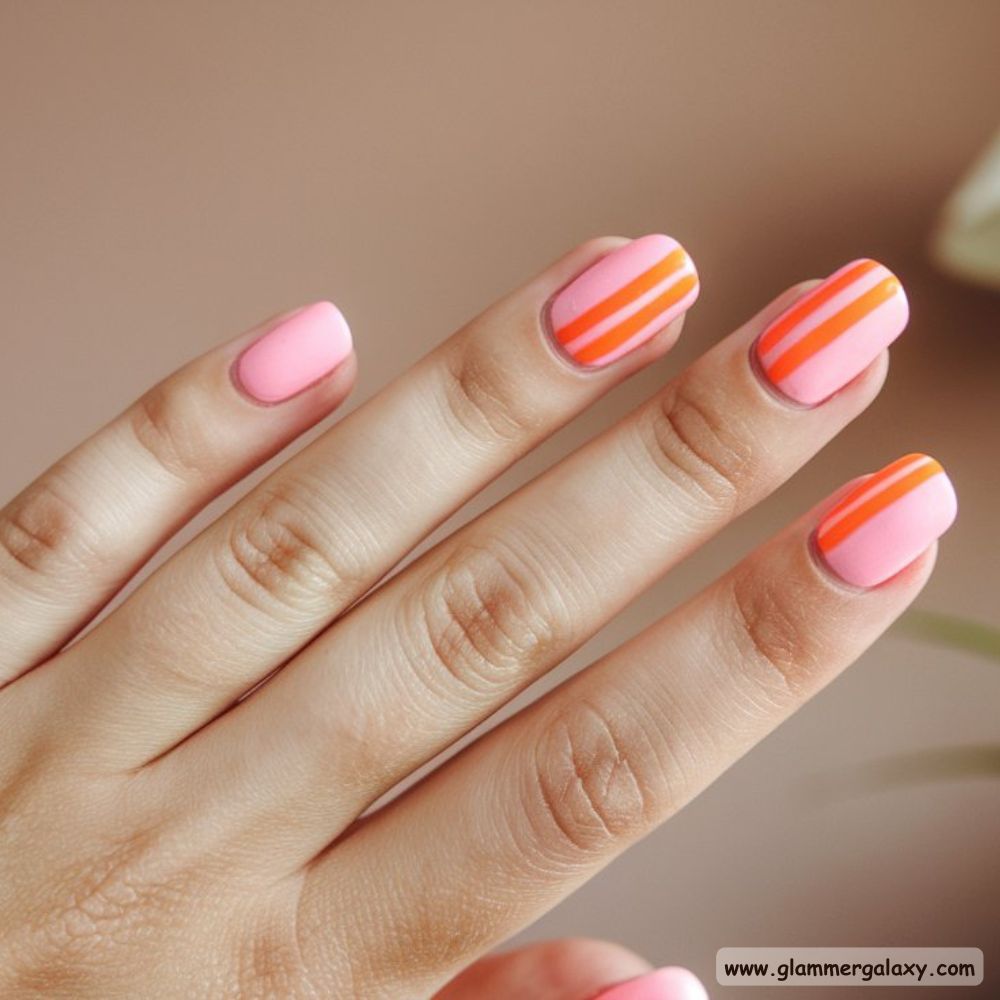 Orange and Pink Summer Nails with Sleek Stripe Design