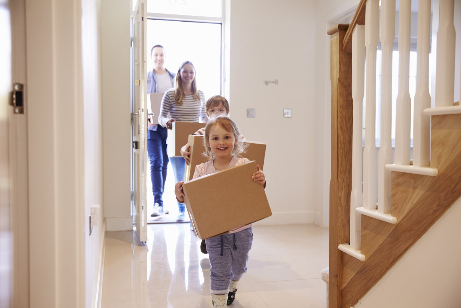 A family moving to a new house bought from a different types of property