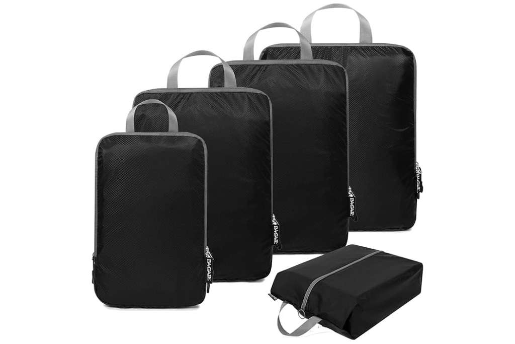 5 black packing cubes with grey handles and zippers