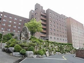 A building with a large rock garden

AI-generated content may be incorrect.