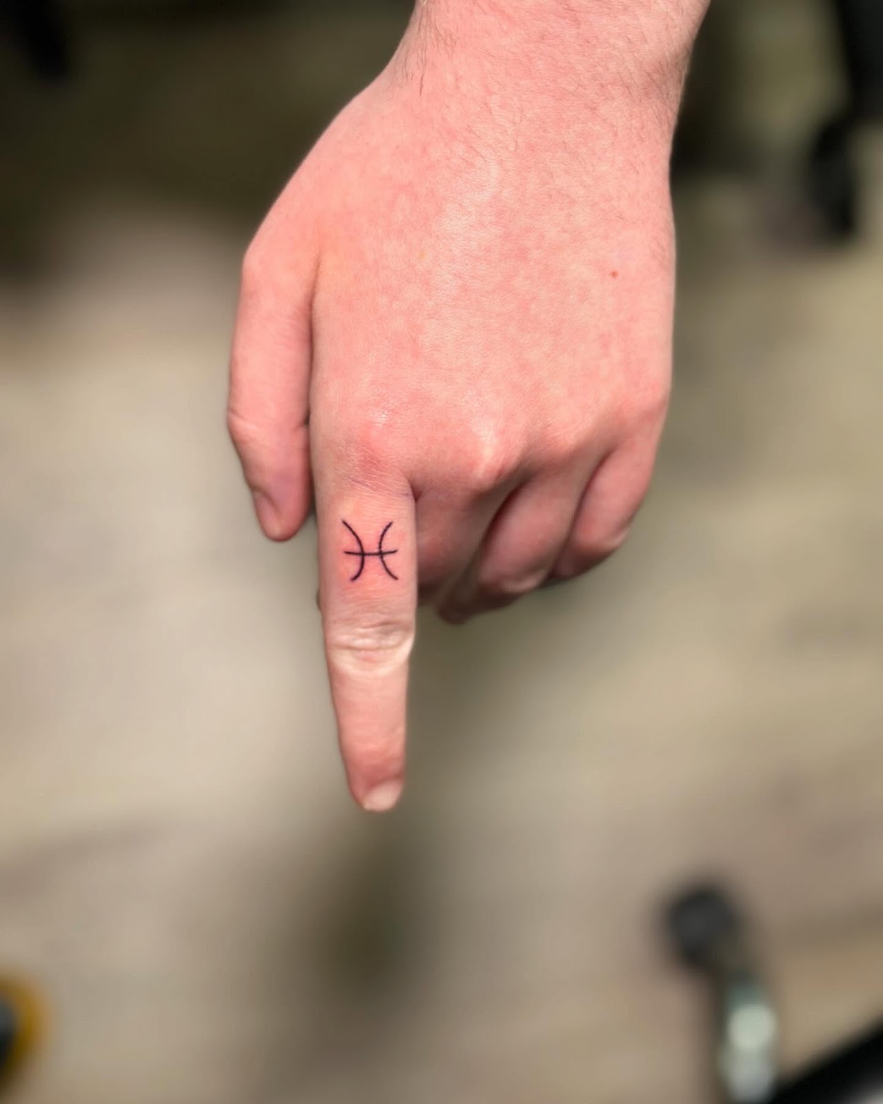 Pisces Finger Tattoo