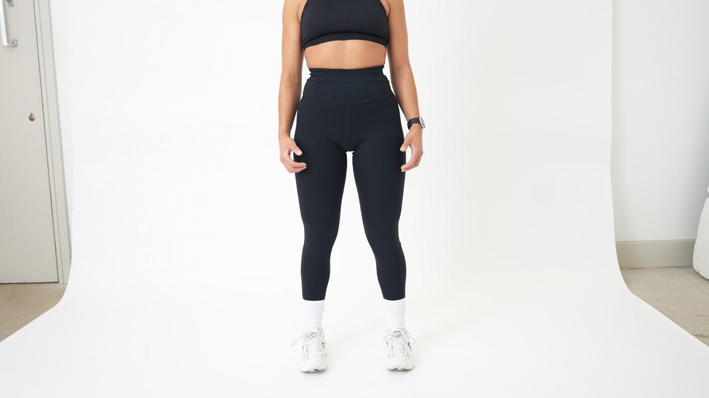 A person in black sports outfit

Description automatically generated