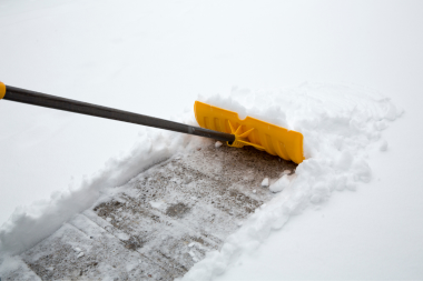 ways to prepare your deck for a michigan winter removing snow off decking with plastic shovel custom built okemos