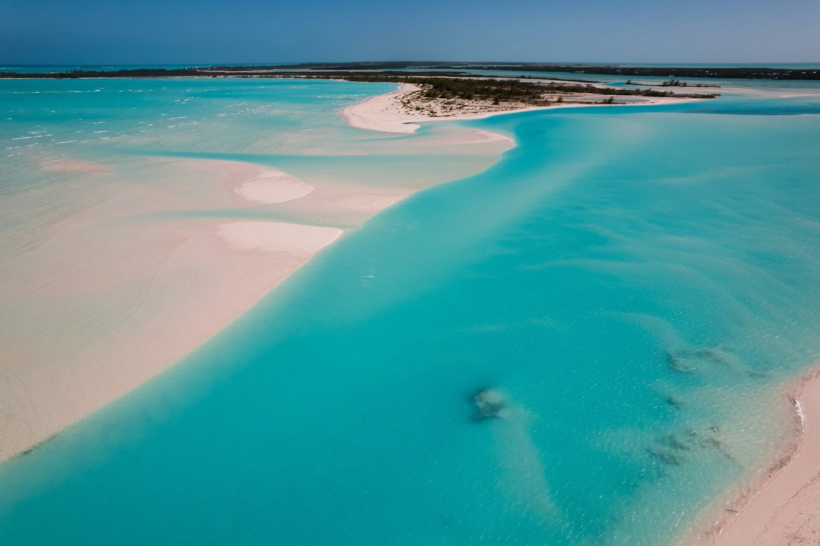 The blush-colored shoreline on Harbour Island is as magical as it sounds—perfect for romantic walks or Insta-worthy photos.