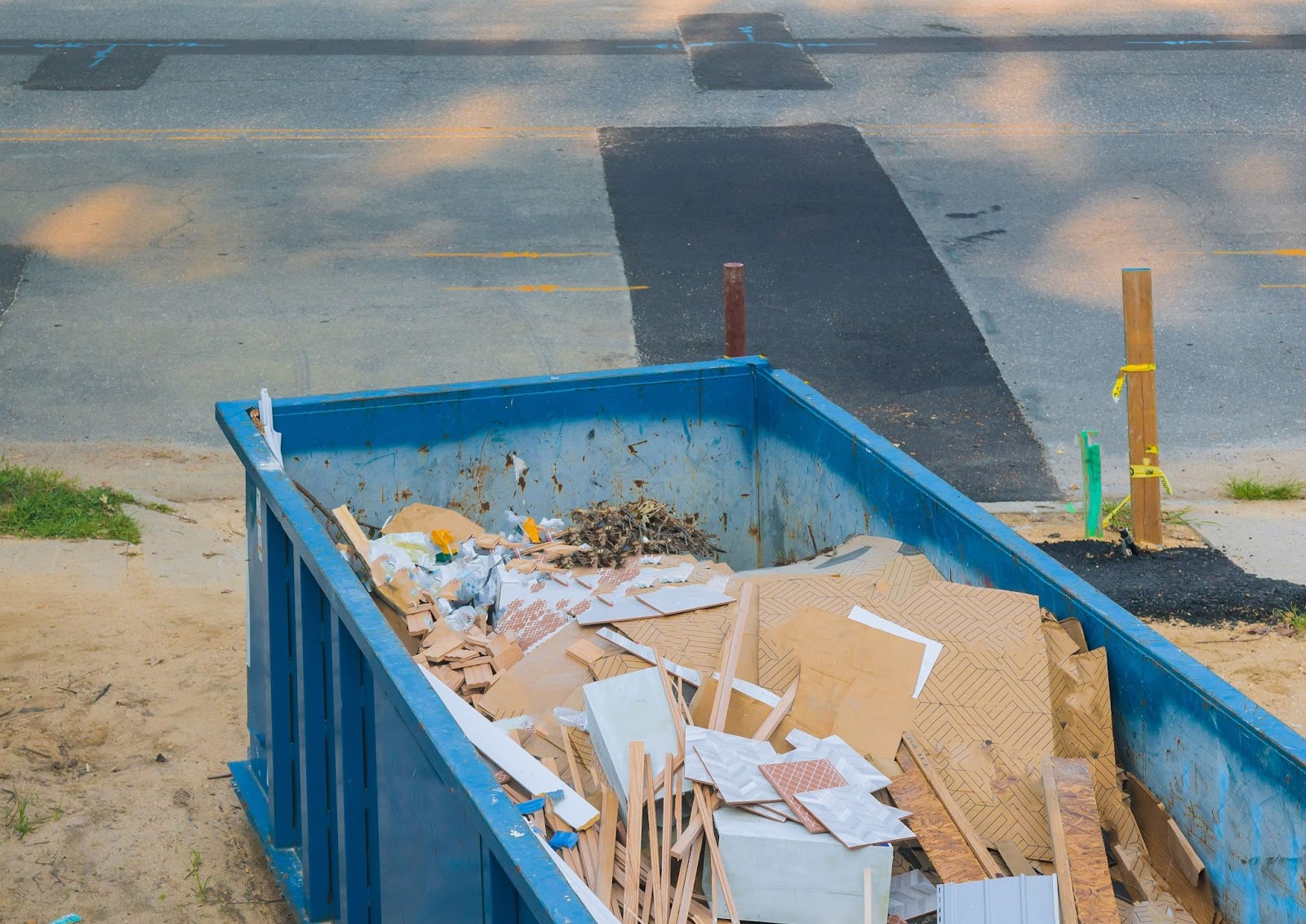 Garbage and recyclables in a dumpster. 